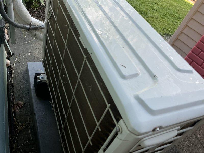 Completed comprehensive preventive maintenance on residential mini-split air conditioning system. Performed standard tuneup procedures including inspection of outdoor condenser unit, verification of proper refrigerant line insulation, cleaning of debris from unit base and surrounding area, and confirmation of proper system operation in cooling mode. Unit found in good working condition with adequate clearance for airflow and all components functioning as designed.