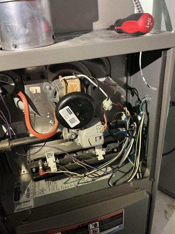 Completed comprehensive gas furnace tune-up and safety inspection per manufacturer specifications. Performed thorough examination of all internal components including blower motor assembly, electrical connections, wiring harnesses, and transformer. Verified proper operation of all safety controls, tested ignition system, and inspected heat exchanger for cracks or deterioration. All components found to be in operational condition with connections secure and properly terminated. Completed required municipal inspection documentation and certification forms.