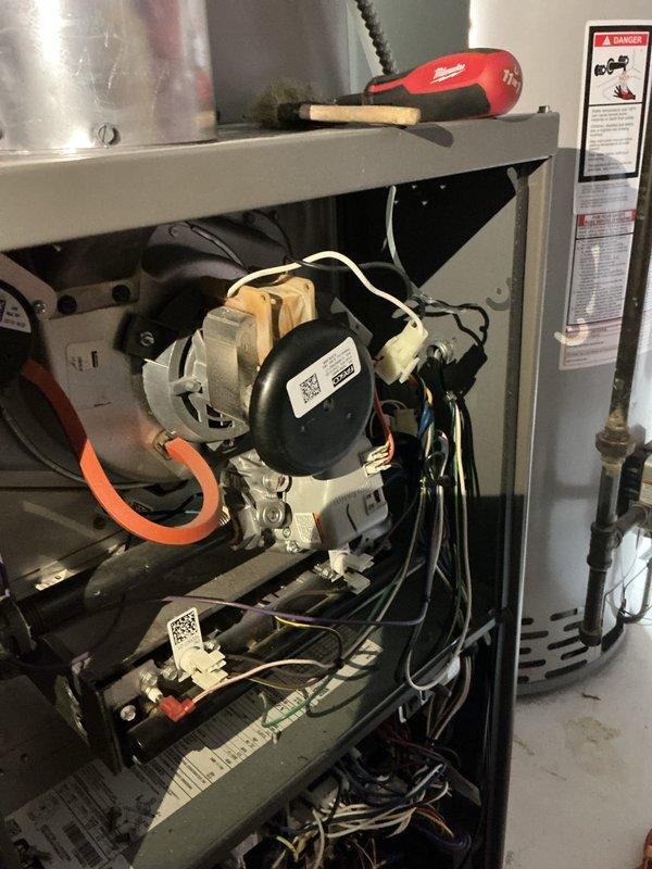 Completed comprehensive gas furnace tune-up and safety inspection per manufacturer specifications. Performed thorough examination of all internal components including blower motor assembly, electrical connections, wiring harnesses, and transformer. Verified proper operation of all safety controls, tested ignition system, and inspected heat exchanger for cracks or deterioration. All components found to be in operational condition with connections secure and properly terminated. Completed required municipal inspection documentation and certification forms.