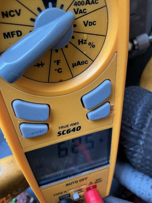 Performed routine AC tune-up maintenance on a 5-year-old outdoor condensing unit. Conducted comprehensive system inspection using digital multimeter to verify electrical parameters, checked refrigerant pressures, cleaned condenser coils, inspected fan operation and protective grille, and confirmed proper unit operation. System found to be functioning within normal specifications with no issues identified or repairs required.