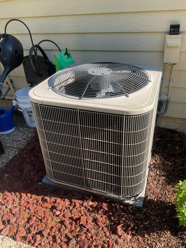 Completed scheduled preventive maintenance tune-up on 12-year-old residential air conditioning system. Performed comprehensive inspection of outdoor condenser unit, including cleaning of condenser coils, verification of refrigerant levels, testing of electrical connections and disconnect box, inspection of fan motor operation and blade condition, and assessment of unit mounting and drainage. System tested and confirmed operating within normal parameters for cooling season.
