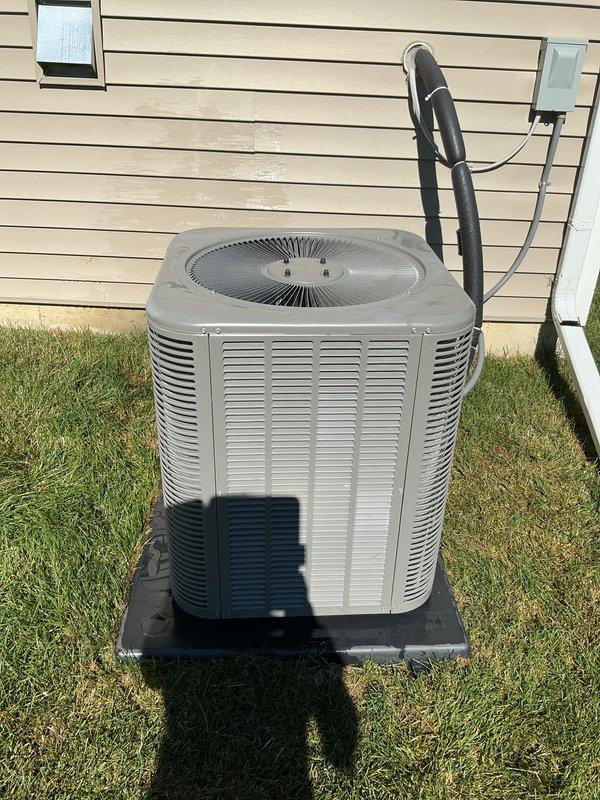 Completed comprehensive annual air conditioning tune-up and preventive maintenance on residential outdoor condenser unit. System was inspected, tested, and found to be operating within normal parameters with all components in good working condition at time of service.