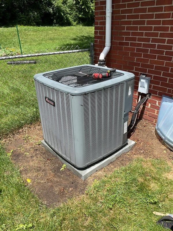 Completed scheduled AC tune-up on residential Amana condenser unit. Performed comprehensive preventive maintenance inspection including cleaning condenser coils, checking refrigerant levels, testing electrical connections, and verifying proper system operation. Unit is functioning within normal parameters and ready for continued service.