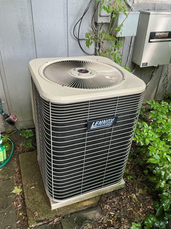 Performed comprehensive tune-up on 10-year-old Lennox air conditioning condenser unit located on exterior concrete pad. Completed full system inspection including refrigerant level check, electrical connection testing, condenser coil cleaning, fan motor operation verification, and capacitor testing. Unit operating within normal parameters with no deficiencies noted; all components functioning properly and system ready for continued service.