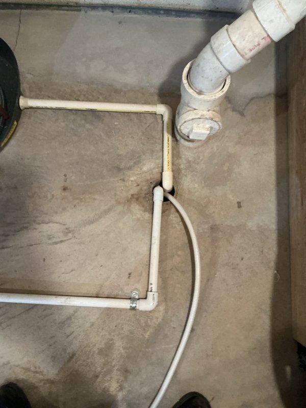 # HVAC Install - Complete System

Completed full residential HVAC system installation in basement mechanical room, including new Bryant furnace, air conditioning system, and whole-home humidifier. Installed all necessary ductwork transitions and metallic supply ducts with proper routing through floor joists. Connected white PVC condensate drain lines from furnace with appropriate trap configuration and drainage routing across floor to designated drain point. Verified all electrical connections, mounted control components on wall adjacent to furnace, and ensured proper clearances around equipment per manufacturer specifications. System tested and operational upon completion.