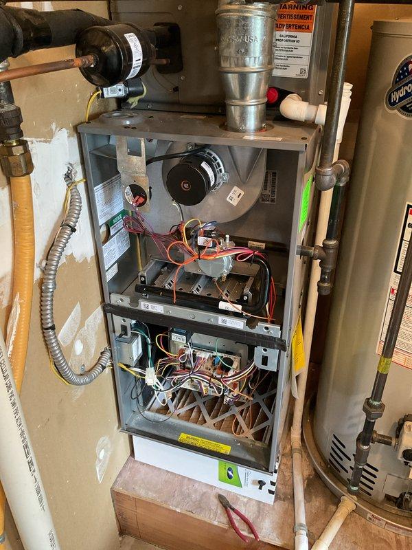 Completed comprehensive multi-system tune-up service on residential HVAC equipment, including air conditioning and gas furnace maintenance on Ruud unit. Performed standard preventive maintenance procedures, inspected internal components including blower motor assembly, heat exchanger, burner assembly, control board connections, and verified proper operation of all electrical and mechanical systems. All equipment access panels were properly secured upon completion of service.