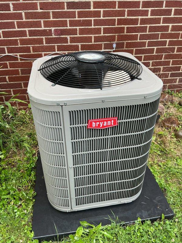 Completed scheduled air conditioning tune-up on Bryant condensing unit. Performed comprehensive system inspection, verified proper operation of all components, and documented equipment condition with photographs showing unit in good operational status with normal wear patterns consistent with outdoor exposure.