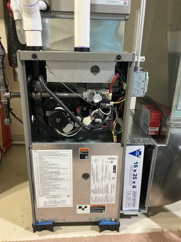 Performed comprehensive multi-system tune-up on residential HVAC equipment including Bryant air conditioning condenser unit, gas furnace, and ERV system. Completed full inspection of furnace internal components with access panel removed, checking blower motor assembly, electrical connections, wiring harnesses, and filter specifications (16x25x4). Inspected outdoor condenser unit positioned on concrete pad, verified operational status of fan motor, examined refrigerant lines, and confirmed proper clearances around equipment.