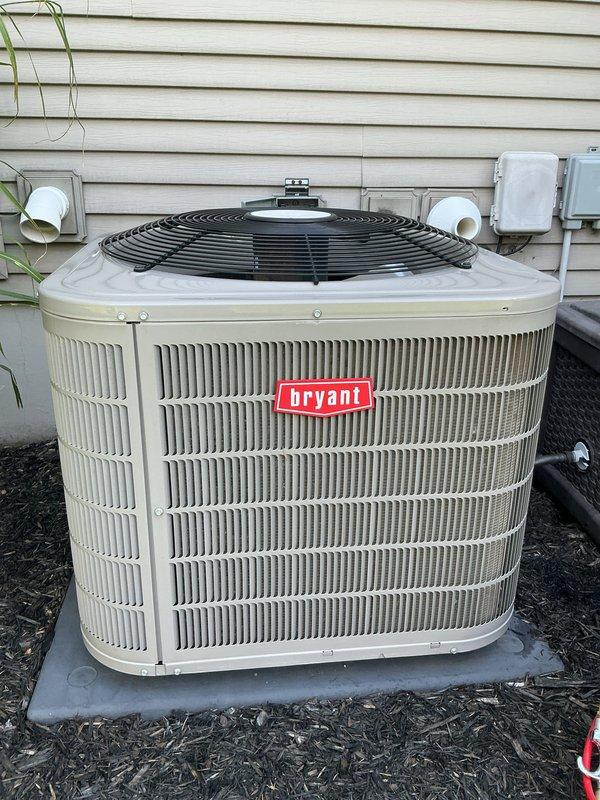 Performed comprehensive multi-system tune-up on residential HVAC equipment including Bryant air conditioning condenser unit, gas furnace, and ERV system. Completed full inspection of furnace internal components with access panel removed, checking blower motor assembly, electrical connections, wiring harnesses, and filter specifications (16x25x4). Inspected outdoor condenser unit positioned on concrete pad, verified operational status of fan motor, examined refrigerant lines, and confirmed proper clearances around equipment.