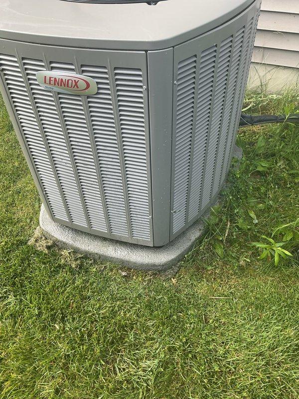 Completed annual AC tune-up on Lennox outdoor unit following extreme heat conditions with 90-degree ambient temperatures. Performed system reset after high-temperature operation, inspected unit exterior and installation, verified proper placement on concrete pad, and updated equipment inventory records with current unit specifications and condition.