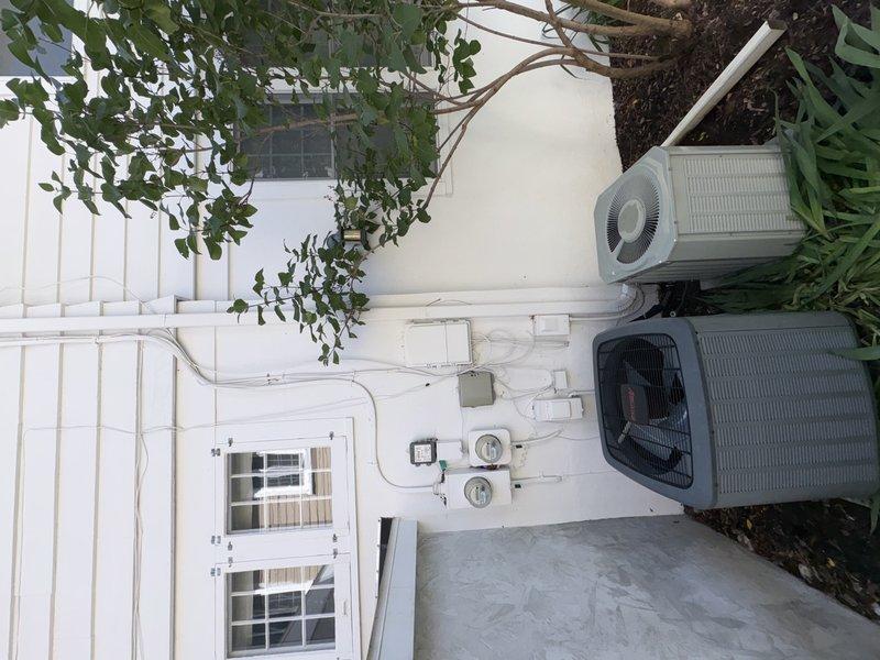 Completed scheduled preventive maintenance on two residential air conditioning systems. Performed comprehensive tune-up procedures on both units, including inspection of the Amana condenser and secondary beige condenser unit, verified proper refrigerant levels, checked electrical connections and components, cleaned condenser coils, and confirmed optimal system operation for both HVAC units.