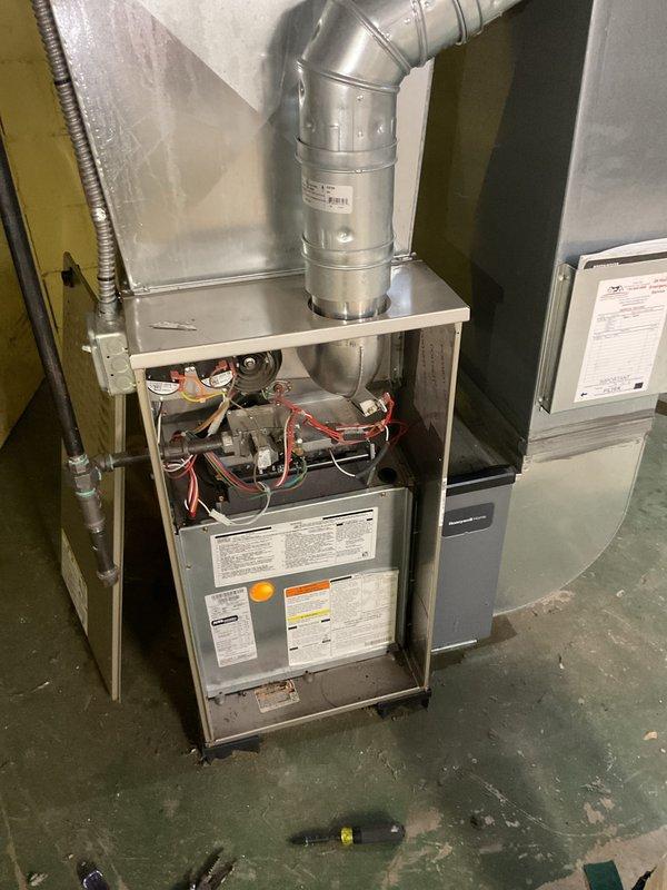 Completed annual tune-up and city certification inspection on Bryant residential furnace system for rental property compliance. Performed comprehensive system evaluation including visual inspection of furnace cabinet, heat exchanger, burner assembly, electrical connections, and ductwork connections. Verified all safety controls operational, tested gas valve and ignition system, checked air filter condition, and confirmed proper ventilation. System found operating within manufacturer specifications with no immediate safety concerns identified. Documentation and certification completed per Ann Arbor Township rental property requirements.