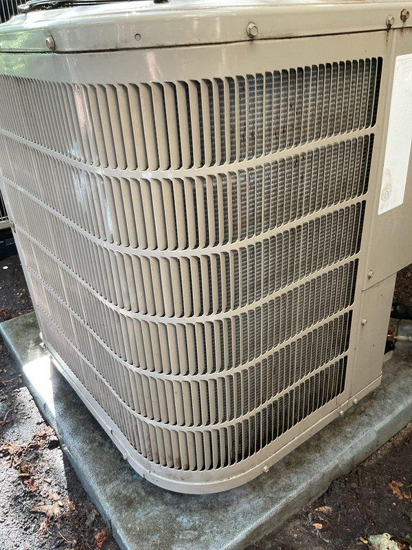 Completed membership air conditioning tune-up on outdoor condenser unit. Performed comprehensive system inspection, including examination of condenser coil fins, refrigerant lines, electrical connections, and fan operation. Unit found in serviceable condition with typical outdoor weathering; verified proper operation and collected membership renewal payment.