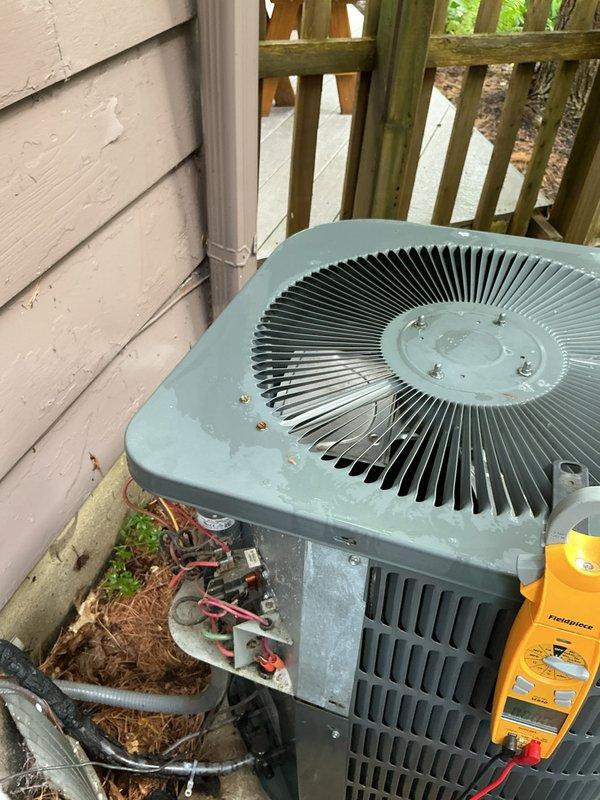 Performed comprehensive preventative maintenance on residential air conditioning system and hot water heater. Completed full tune-up of outdoor condenser unit including inspection of electrical connections, refrigerant levels, and fan operation. Cleaned debris from unit base and verified proper system functionality. All equipment operating within manufacturer specifications at time of service completion.