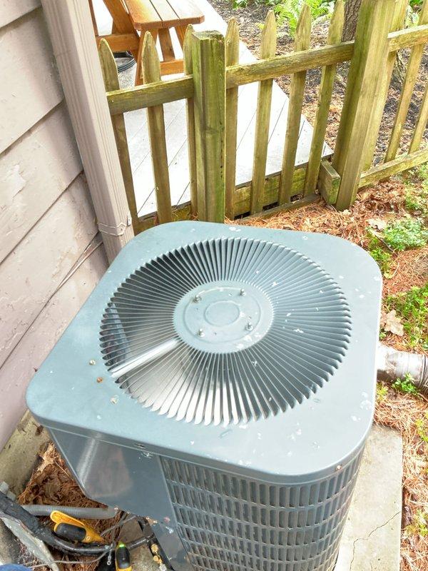 Performed comprehensive preventative maintenance on residential air conditioning system and hot water heater. Completed full tune-up of outdoor condenser unit including inspection of electrical connections, refrigerant levels, and fan operation. Cleaned debris from unit base and verified proper system functionality. All equipment operating within manufacturer specifications at time of service completion.