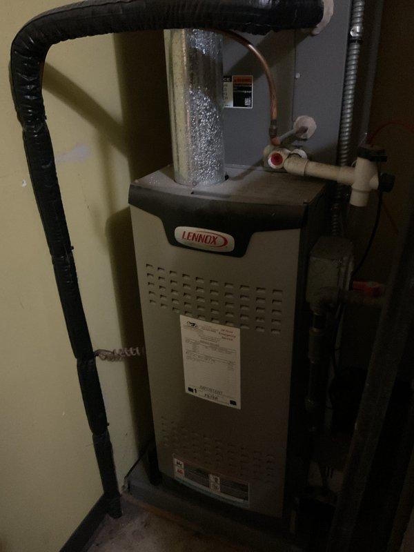 Performed comprehensive tune-up on Lennox gas furnace system, including inspection of all major components, burner assembly, heat exchanger, blower motor, and electrical connections. Verified proper operation of condensate drainage system and PVC venting, confirmed all safety controls functioning within manufacturer specifications, and documented equipment condition with photographic records per municipal compliance requirements.