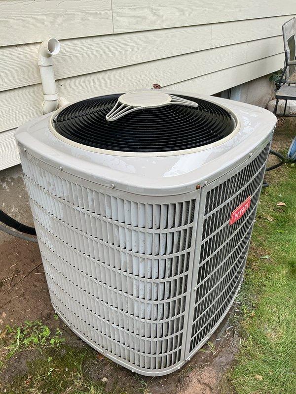 Completed annual air conditioning tune-up and preventative maintenance on outdoor condensing unit. Inspected and serviced all components including condenser coils, fan motor, and refrigerant lines. Noted furnace filter requires replacement; ordered two replacement filters for future installation with one temporary filter currently in use until new filters arrive at shop.