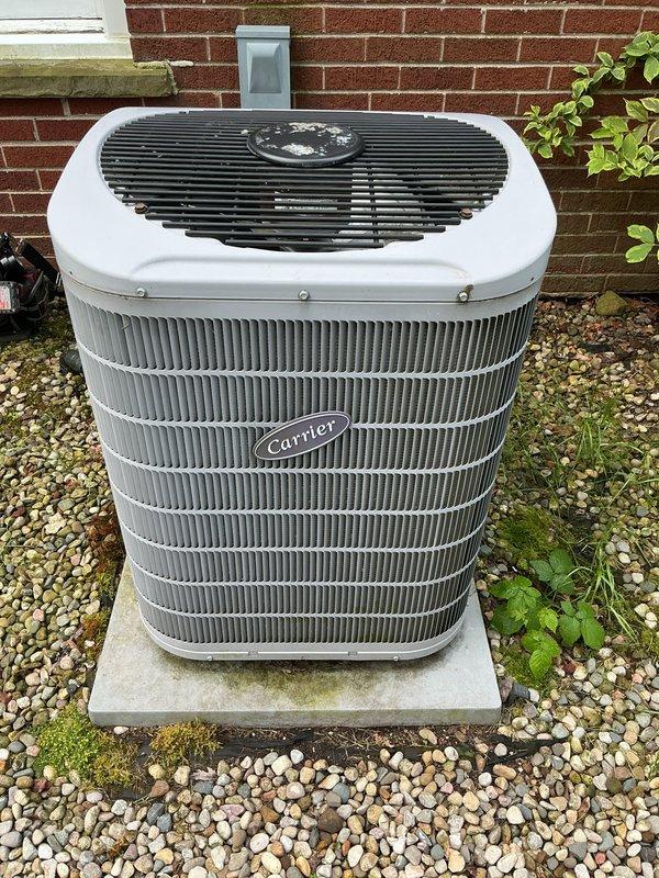 Completed scheduled cooling system maintenance on residential Carrier air conditioning unit. Performed comprehensive tune-up including inspection of condenser coils, refrigerant levels, electrical connections, and fan operation. Unit tested and operating within normal parameters. System returned to full cooling functionality.
