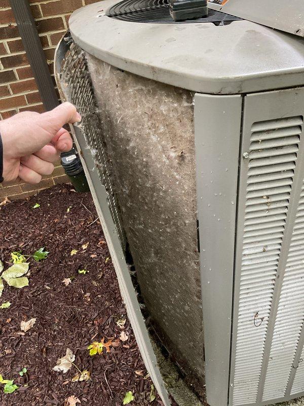 Completed comprehensive preventive maintenance on residential HVAC system including indoor gas furnace and outdoor air conditioning unit. Performed full tuneup procedures on Lennox furnace/air handler located in utility closet, inspecting combustion components, verifying proper airflow, and checking filter condition. Serviced outdoor AC condenser unit, which exhibited significant debris accumulation and clogged intake surfaces requiring attention. Cleaned condenser coils and removed heavy buildup of dirt, organic matter, and vegetation from unit exterior to restore proper airflow and system efficiency. Verified all electrical connections, refrigerant levels, and operational parameters on both systems to ensure optimal performance for upcoming cooling season.