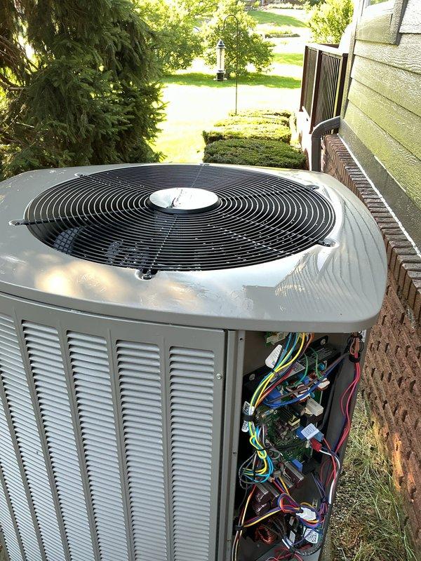 Performed comprehensive air conditioning tune-up for new customer on two Lennox outdoor condenser units. Addressed customer concern regarding cottonwood debris accumulation around equipment by cleaning condenser coils, fan grilles, and surrounding area. Inspected electrical connections and control boards on both units, verified refrigerant levels, tested system operation, and enrolled customer in preventative maintenance program with gas furnace maintenance scheduled for early December.