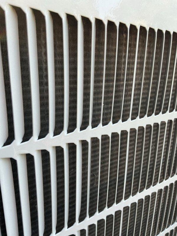 Completed annual AC tune-up on 2020 Bryant outdoor condenser unit. Performed comprehensive system inspection, verified proper airflow through return air grille, and documented equipment condition with unit showing excellent maintenance and clean operation. All components functioning within normal parameters.