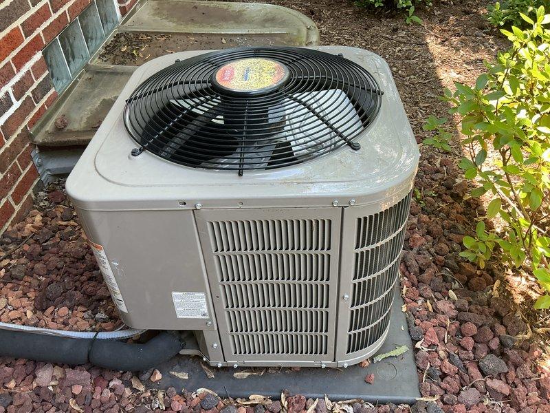 Performed comprehensive maintenance on residential air conditioning system and hot water tank as part of multi-system service agreement. Conducted thorough inspection of outdoor condenser unit, including examination of fan motor operation, compressor function, and condenser coil condition. Verified refrigerant line connections and insulation integrity. Assessed overall unit performance and documented equipment condition through photographic records. Hot water tank maintenance completed as carryover from previous membership term. Property equipped with gas furnace, air conditioning, hot water tank, and energy recovery ventilator requiring ongoing preventive maintenance services.