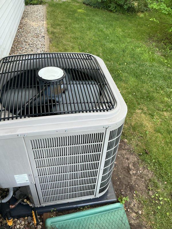Performed routine HVAC maintenance on residential air conditioning system. Conducted diagnostic testing using Fieldpiece meter to verify system performance and operational parameters. Inspected outdoor condenser unit, confirmed proper airflow through coil fins, and verified fan motor operation and protective grille integrity.