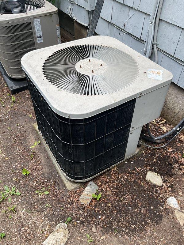 Completed comprehensive preventative maintenance tune-ups on two residential air conditioning systems: a 2021 model unit and a 1998 model unit, both located on exterior concrete pads. Performed standard inspection protocols including checking refrigerant levels, cleaning condenser coils, inspecting electrical connections, testing capacitors, verifying proper airflow through louvered panels, and ensuring both systems operate within manufacturer specifications for optimal cooling performance.