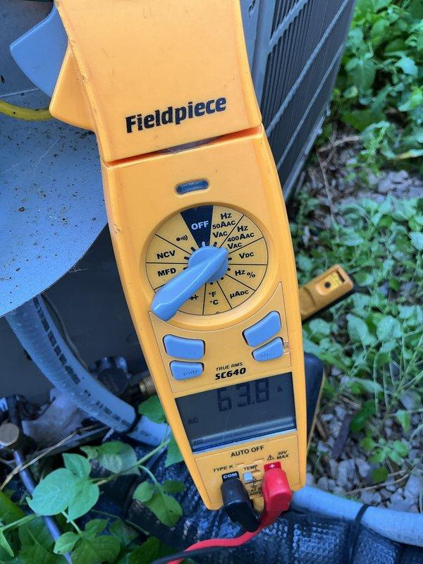 Completed comprehensive AC tune-up on 2020 residential unit. Performed electrical testing using digital multimeter, verified capacitor readings at 6.98 MFD within acceptable range, and inspected all system components. Unit operating efficiently with no issues found; all maintenance tasks completed per prepaid service agreement.