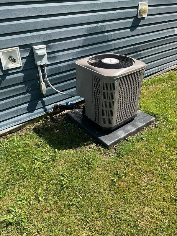Completed recurring maintenance service on residential air conditioning system. Unit was found in good operating condition with clean condenser coils, proper electrical connections, and secure mounting on concrete pad. Performed standard preventive maintenance procedures and verified system functionality, restoring cooling operation to normal parameters.