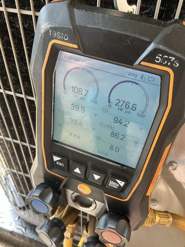 Responded to no cooling complaint on recently installed system under full warranty. Upon arrival, performed complete system diagnostics using refrigerant gauges to verify operating pressures and temperatures. Measured suction pressure at 102-107 psi and discharge pressure at 265-277 psi, with corresponding temperature readings indicating system was cycling properly and operating within manufacturer specifications. Verified all components functioning correctly with no defects found.