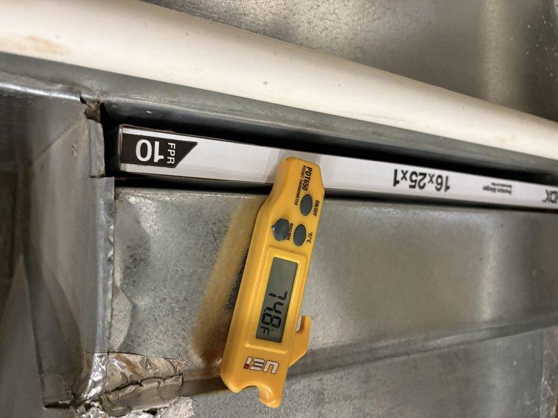 Completed comprehensive gas furnace tune-up and performance evaluation, including temperature differential measurements at supply ductwork (-18.1°F reading indicated) and register airflow verification. Filled out required city certification documentation and assessed water heater condition, recommending flushing based on visual inspection and age of unit.