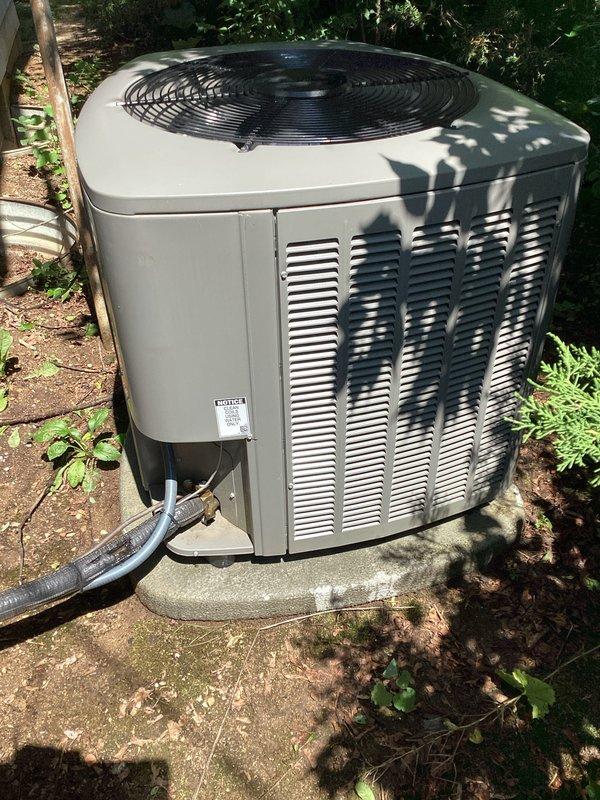 Completed routine HVAC maintenance on two outdoor air conditioning condenser units at residential property. Performed standard inspection of both systems, verified proper operation of condenser fans, checked refrigerant levels, inspected electrical connections and disconnect boxes, and cleared debris from around units to ensure adequate airflow and optimal performance.