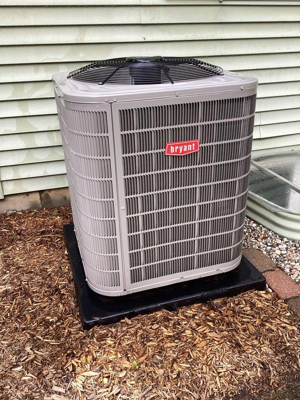 Completed annual air conditioning tune-up on Bryant outdoor condensing unit. Performed comprehensive system inspection, verified unit operation, and documented equipment condition with photos showing proper installation on pad with adequate clearance. Membership was reactivated and follow-up service appointment scheduled.