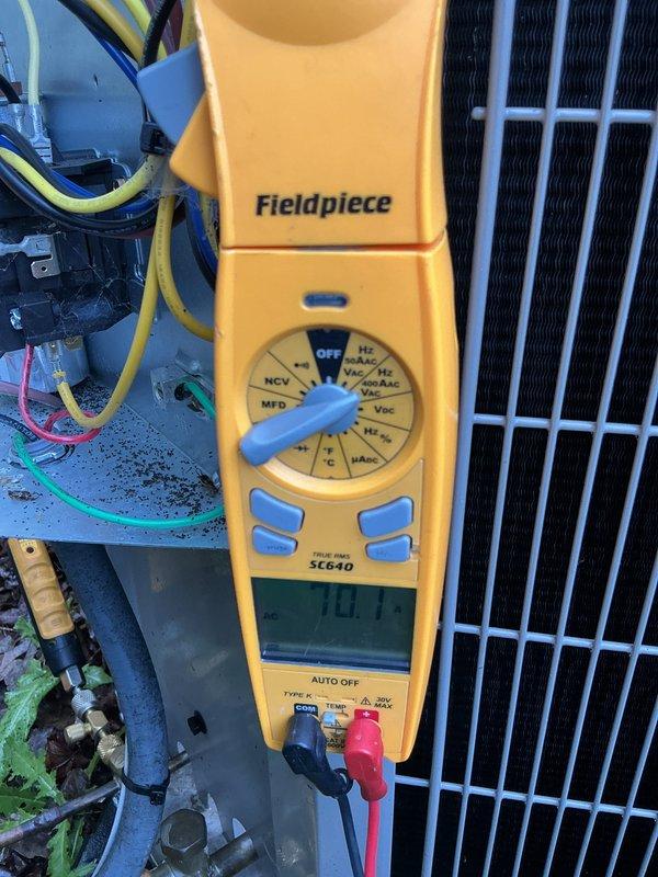Completed comprehensive air conditioning tune-up on newer residential condensing unit. Performed electrical diagnostics using digital multimeter, verified proper voltage and amperage readings at compressor and fan motor, and inspected all electrical connections within unit's control panel. System operating within manufacturer specifications with no deficiencies noted.