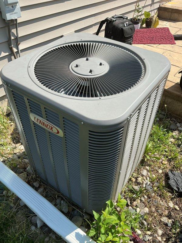 Performed comprehensive preventive maintenance tune-up on 13-year-old Lennox air conditioning system. Inspected outdoor condenser unit, verified proper operation of fan motor and compressor, checked refrigerant levels, cleaned condenser coils, and tested electrical connections and controls. Unit operating within normal parameters with no issues identified at time of service.