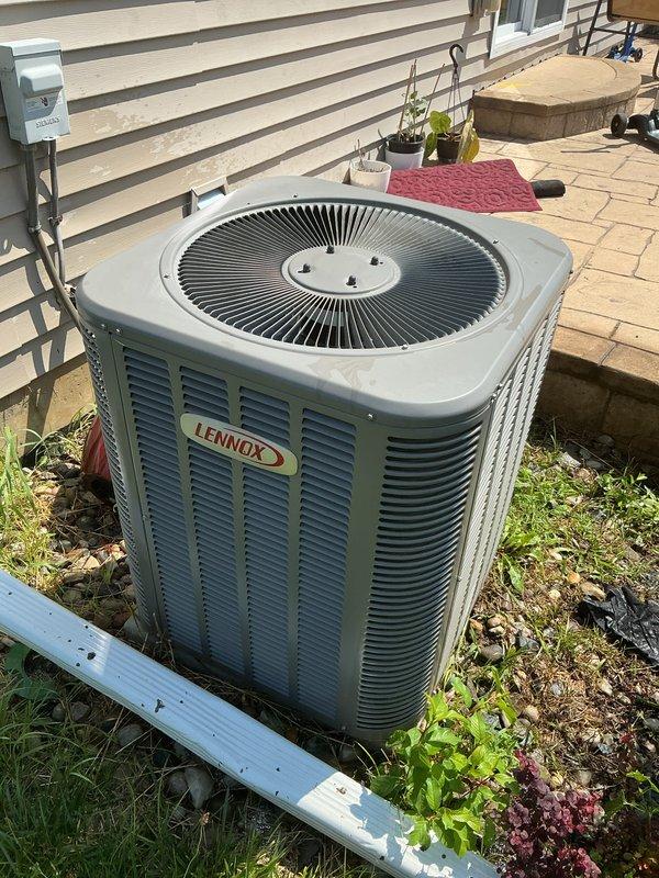 Performed comprehensive preventive maintenance tune-up on 13-year-old Lennox air conditioning system. Inspected outdoor condenser unit, verified proper operation of fan motor and compressor, checked refrigerant levels, cleaned condenser coils, and tested electrical connections and controls. Unit operating within normal parameters with no issues identified at time of service.