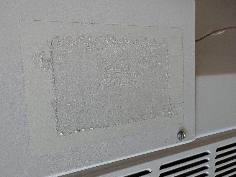Responded to no-cooling call with thermostat displaying no power and water present on floor near air handler. Diagnosed tripped circuit breaker due to clogged condensate drain line causing secondary overflow switch activation. Cleared condensate line blockage, reset breaker in electrical panel, and verified system operation with proper cooling restored and thermostat powered on.