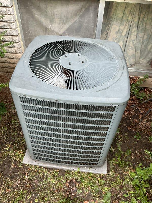 Completed membership maintenance tune-up service on residential HVAC system and water heater. Performed comprehensive inspection of outdoor condenser unit, verified proper operation of fan assembly and heat exchange coils, confirmed unit integrity and airflow through louvers, and documented equipment condition with photos. All components found operating within normal parameters with no immediate service needs identified.