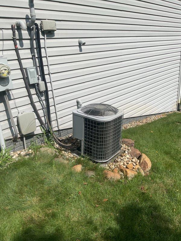 Responded to no-cool complaint on 20-year-old Comfortmaker central air conditioning system with weak cooling output and inability to maintain setpoint. Customer reported previous refrigerant leak repair last year with recurring symptoms. Performed comprehensive AC tune-up including system inspection, refrigerant charge verification, and operational testing. Evaluated condenser unit exterior condition, refrigerant line connections, and electrical components. System restored to proper cooling capacity with ability to maintain desired temperature range. Collected payment for annual maintenance renewal agreement.