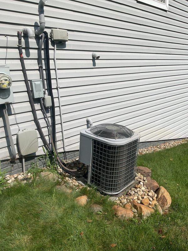 Responded to no-cool complaint on 20-year-old Comfortmaker central air conditioning system with weak cooling output and inability to maintain setpoint. Customer reported previous refrigerant leak repair last year with recurring symptoms. Performed comprehensive AC tune-up including system inspection, refrigerant charge verification, and operational testing. Evaluated condenser unit exterior condition, refrigerant line connections, and electrical components. System restored to proper cooling capacity with ability to maintain desired temperature range. Collected payment for annual maintenance renewal agreement.