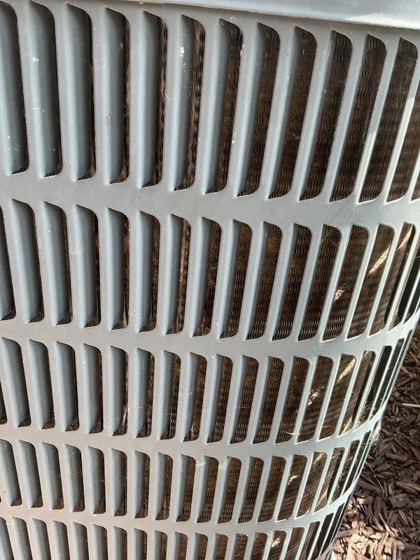 Completed scheduled maintenance on residential air conditioning system. Inspected outdoor condenser unit, verified proper operation of fan motor and compressor, and confirmed adequate airflow through coil fins. Unit restored to normal cooling operation with no deficiencies noted.