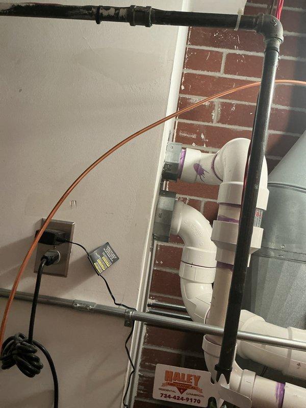 Completed full HVAC system installation in residential mechanical room, including new Bryant furnace unit mounted on concrete pad with proper venting configuration utilizing white PVC piping system. Installed and integrated complete air distribution ductwork with metallic supply and return runs, coordinated plumbing connections including copper piping, and established all electrical connections with proper conduit routing and outlet configuration to ensure code-compliant operation of heating and cooling equipment.