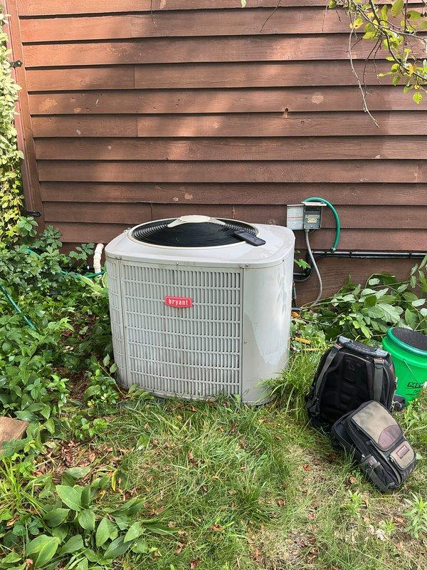 Performed comprehensive air conditioning tune-up on outdoor condenser unit, including inspection of electrical disconnect, refrigerant lines, and condenser coil. Verified proper operation of all components, confirmed adequate airflow through unit grille, and collected membership renewal payment as requested.