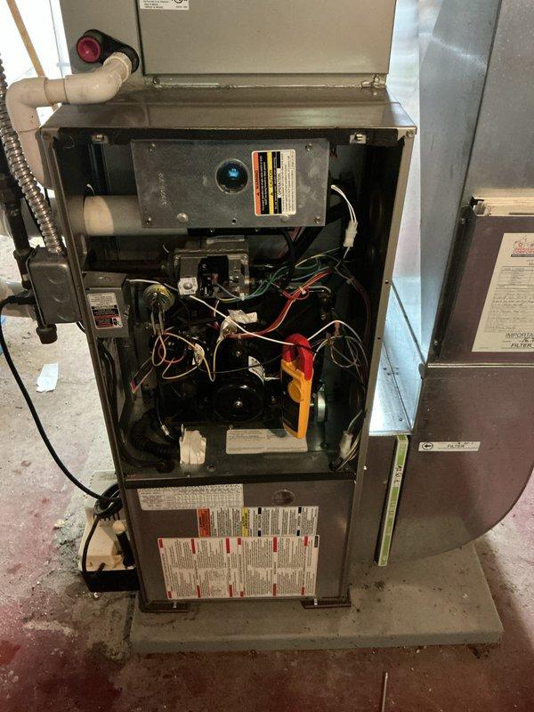 Completed annual HVAC maintenance visit for residential split system including both indoor furnace/air handler unit and outdoor Puron condensing unit. Performed comprehensive inspection of all system components, checked electrical connections, verified proper operation of blower motor assembly, inspected ductwork connections, and evaluated refrigerant lines and condensate drainage system. All equipment found operating within normal parameters with no issues identified during tune-up service.