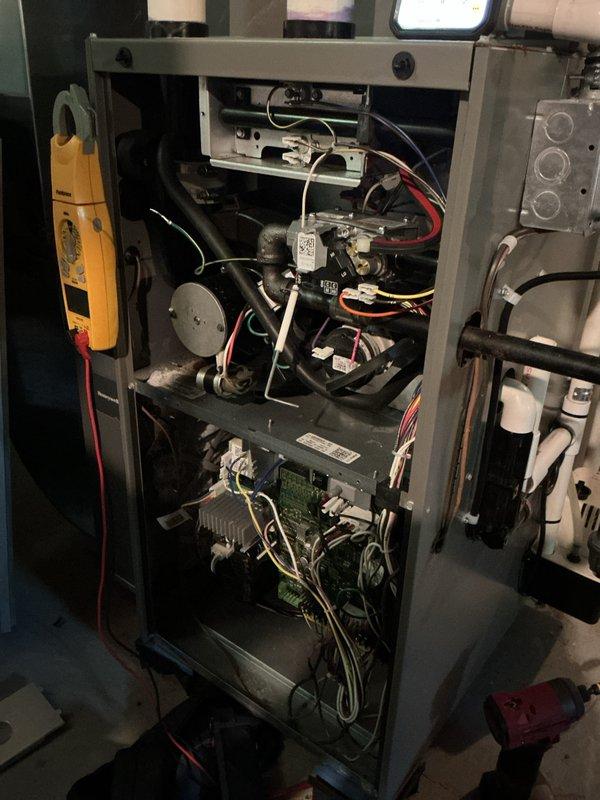 Completed preventive maintenance tune-up on 2023 residential split system air conditioning unit as part of complimentary service included with installation. Performed comprehensive inspection of indoor furnace/air handler components including blower motor assembly, control board, wiring connections, and capacitor; verified all electrical connections secure and tested system operation. Inspected outdoor condensing unit, checked refrigerant pressures, cleaned condenser coil, verified fan motor operation, and confirmed proper system performance and airflow throughout.