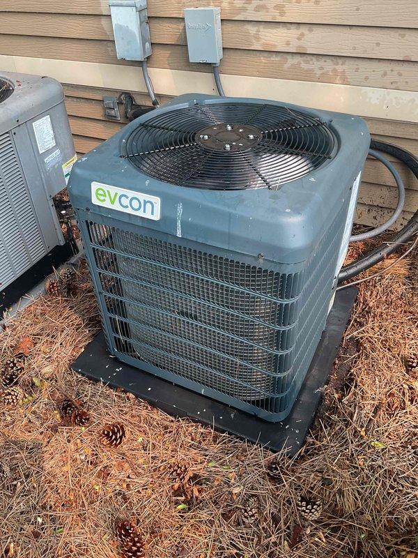 Completed scheduled air conditioning tune-up on Evcon outdoor condensing unit. Performed comprehensive maintenance inspection, verified proper operation of compressor and condenser fan motor, checked refrigerant pressures, and documented equipment condition with photos. Unit operating within normal parameters upon completion of service.