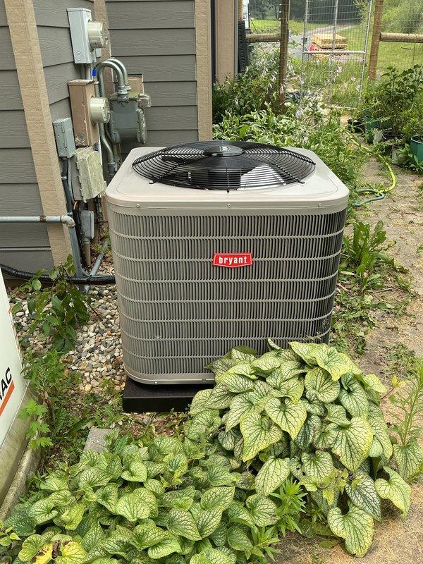 Completed full HVAC system installation including new furnace, air conditioner, humidifier, and air purification system. The Bryant condenser unit was installed on exterior pad with proper clearances and landscaping considerations, while indoor equipment was positioned in utility room with appropriate drainage and ventilation. All components were connected, tested, and confirmed operational per manufacturer specifications.