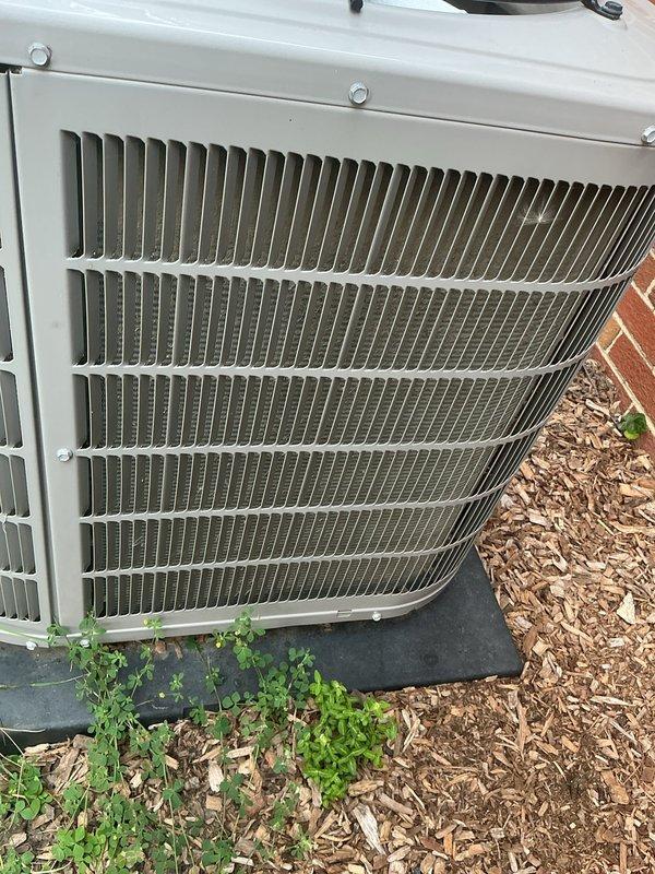 Responded to service call for 2021 installation under full warranty with complaint of system not maintaining set temperature (74°F thermostat setting with actual temperature reading 78°F). Performed diagnostic evaluation of Bryant condenser unit and confirmed system operation. Unit exterior showed normal weathering with clean functional fins and proper mounting on pad, with no visible mechanical deficiencies noted during inspection.