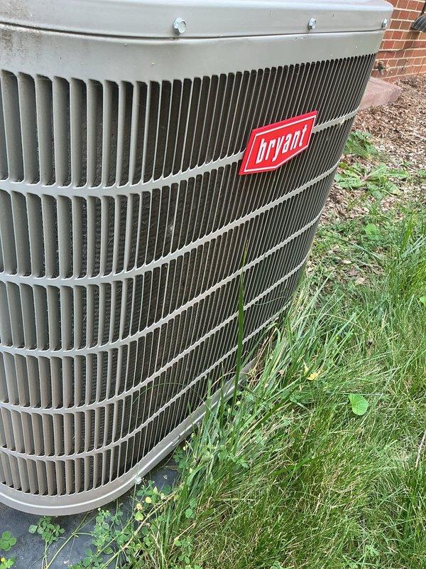 Responded to service call for 2021 installation under full warranty with complaint of system not maintaining set temperature (74°F thermostat setting with actual temperature reading 78°F). Performed diagnostic evaluation of Bryant condenser unit and confirmed system operation. Unit exterior showed normal weathering with clean functional fins and proper mounting on pad, with no visible mechanical deficiencies noted during inspection.